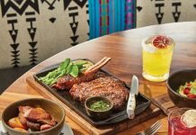 Dining Out at My Neighbor Felix 18 oz. bone-in ribeye steak; peach margarita; guacamole fresco; mezcalita; blackened Chilean sea bass; adobo fingerling potatoes