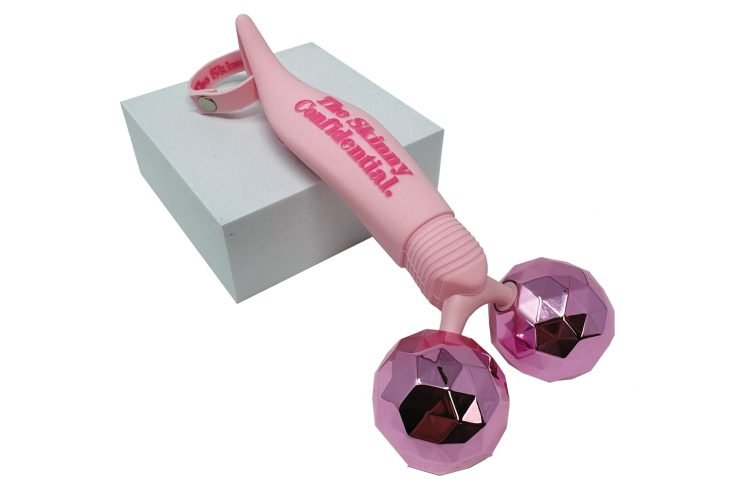 Pink balls face massager