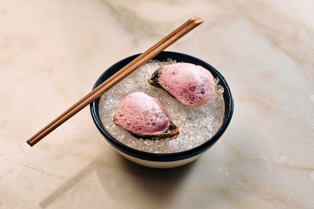 Oysters in pomegranate foam
