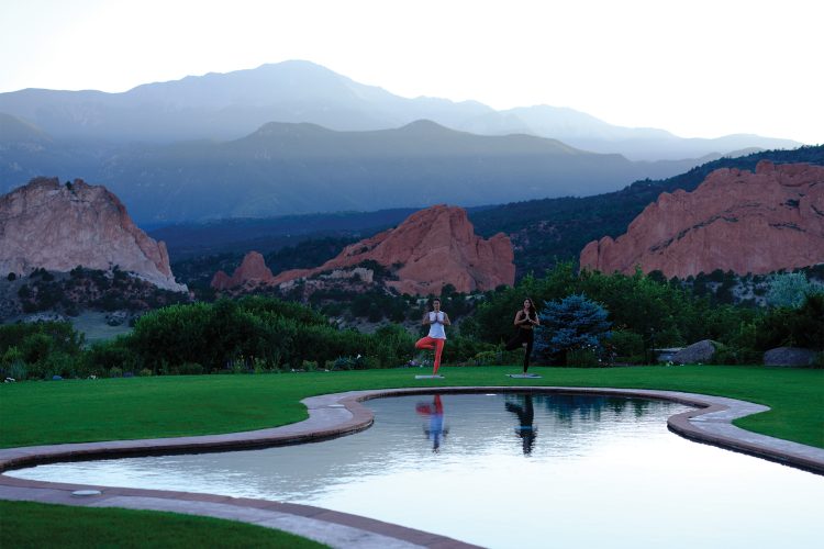 Yoga at the Garden of the Gods Resort reflection pool