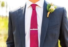 Man wearing magenta Kind Design tie