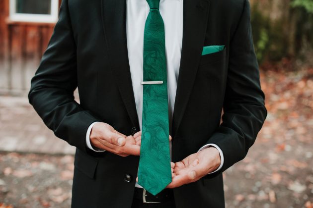 Man wearing green Kind Design tie