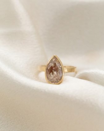 The Octavia 2.15 ct Pear Rustic Bezel