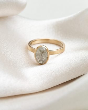 The Octavia 1.84 ct Oval Rustic Diamond Bezel Solitaire