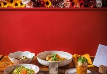 Clockwise from top: Fish Kiev, Layered Kissel, Tomato “Kholedets,” Chicken Paprikash, Corn + Crab Varenyky, and Beet and Plum Borscht