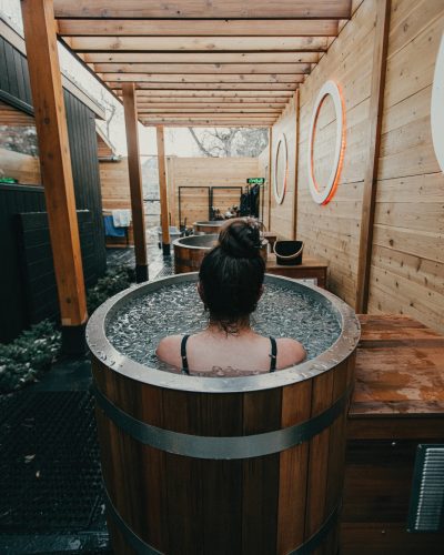 Woman in cold plunge pool