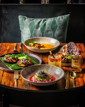 Caldito de Chilpachole, salsa platter, Margarita de Tomatillo, ceviche, and Sikil Pak.