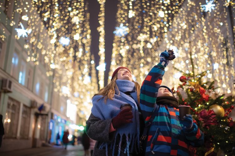 Family enjoys holiday lights display