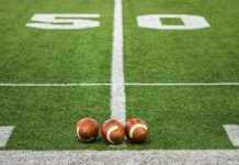 5 Rules for Throwing a Super Bowl Party Footballs on 50 yard line