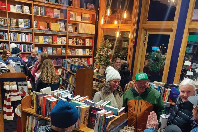 Shoppers inside Between the Covers bookstore