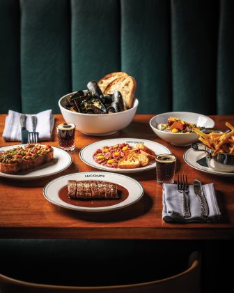 Selection of dishes from Jacques including mussels, beets, fries, beef tartare, steak, chicken liver pâté, and two mini espresso martinis