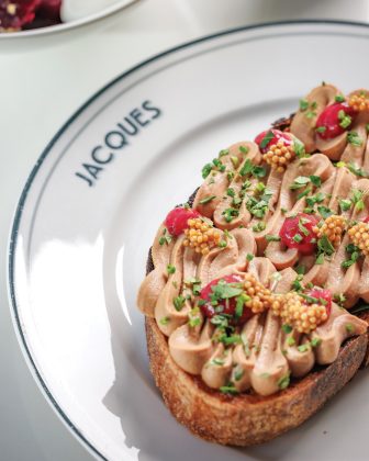 Chicken liver pâté with chicken liver, butter, and topped with seasonal mostarda.