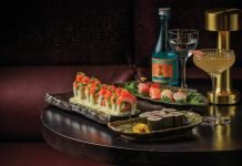 Kikusui sake; nigiri: dry-aged toro, king salmon, orange yellowtail, barracuda.;Yuzu Bee cocktail; Negitoro roll; and Sake roll at Kumoya.