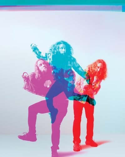 Josh Blue posing in three poses.