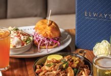 Elway’s New Renovation Offers a Dining Experience Fit for a Champion The fish sandwich with house salad, Rhode Island-style calamari, light beer, prime rib sandwich with fries, and Arnold Palmer at Elways.