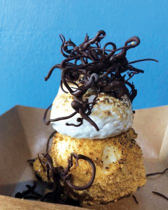 The the s’more sundae topped with “magic” chocolate at The Inventing Room.