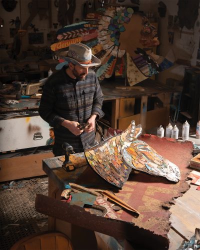 Dolan Geiman working on his artwork.