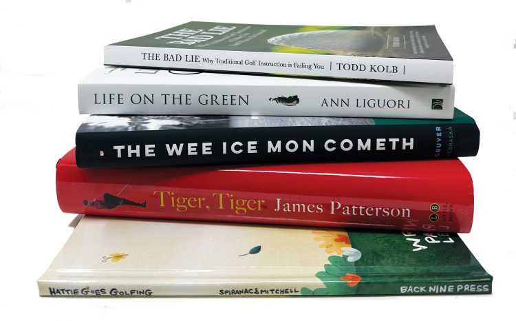 Stack of books listed below.