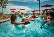 Children float in the waterpark at Gaylord of the Rockies.