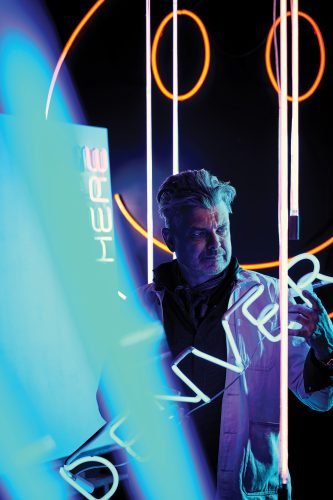 Scott Young with his art.