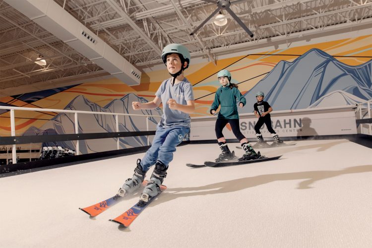 People ski at SNÖBAHN Action Sports Center