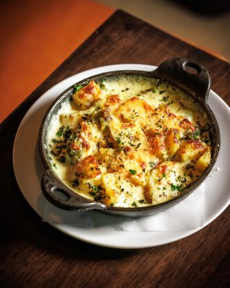 The green chili cheese potatoes at Carne