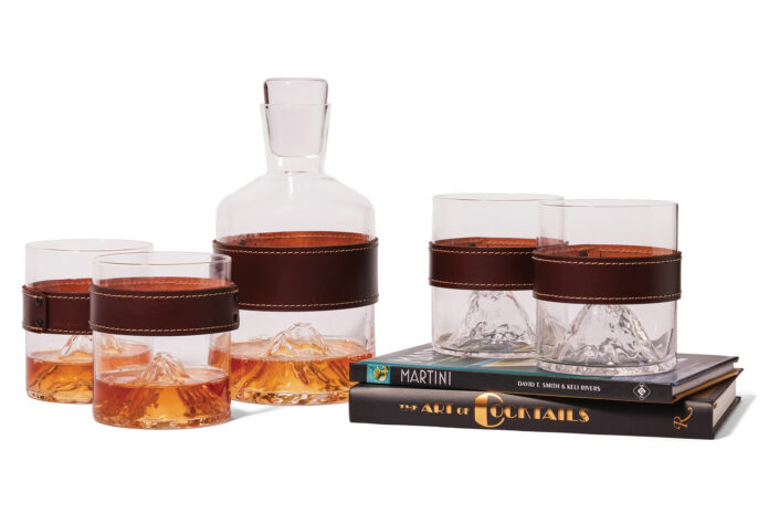 Cocktail books and glasses from The Den.