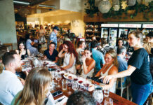 Leven Launches a Wine Club Worth Joining People attend a wine tasting at Leven.