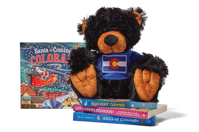 Stuffed bear and books from Peak-a-Boo Toys.