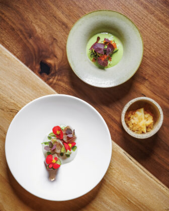 The tuna crudo with coconut broth, avocado, and pickled cucamelon, charred, sprouting cauliflower with trout roe, basil, and green curry, compressed apple with yuzu and apple granita.