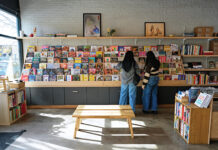 Carbon Knife Co. Creates a Library for Cooks Customers explore the bookshelf at Carbon Knife Co.