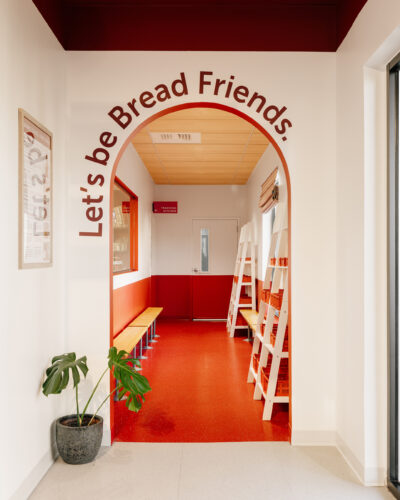 Archway in Rebel Bread that reads "Lets be Bread Friends," above it.