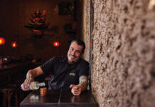 Chef José Avila Brings Two Cultures Together on Denver Plates Chef José Avila poses at a table in Malinche Audiobar.