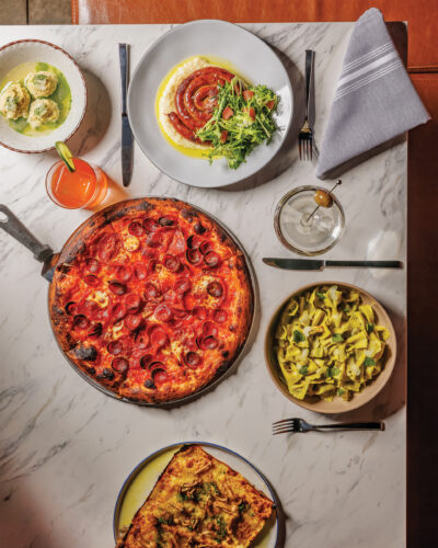 Clockwise from top: chicken meatballs, sweet talker cocktail, Lottie’s spiral sausage, Nonnas tini cocktail, farfalle, lasagnetta, double pepperoni pizza.