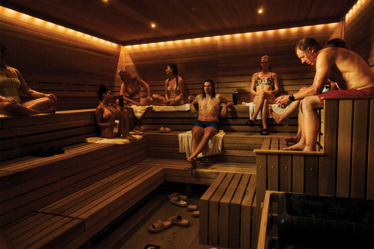 People relax in a sauna.
