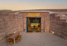 Settle Into the Stone Exterior of cave suites at Honey Rock Landing.