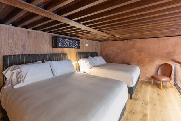 Loft area in a cave suite at Honey Rock Landing.