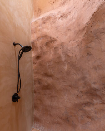 Shower in the cave at Honey Rock Landing.