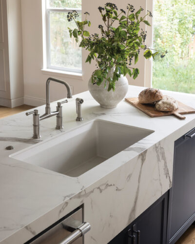 Kitchen sink and island by Dennison Interior Design.