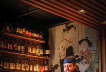 Master Sommelier Adam Boggeri at work pouring sake.