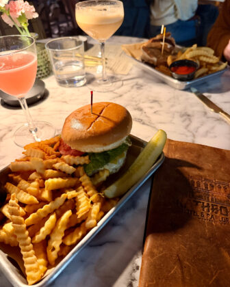 A burger and fries at The Rathbone Hotel & Parlor Bar.