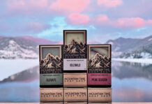 Soaps from Mountain Time Soap set against a mountain backdrop.