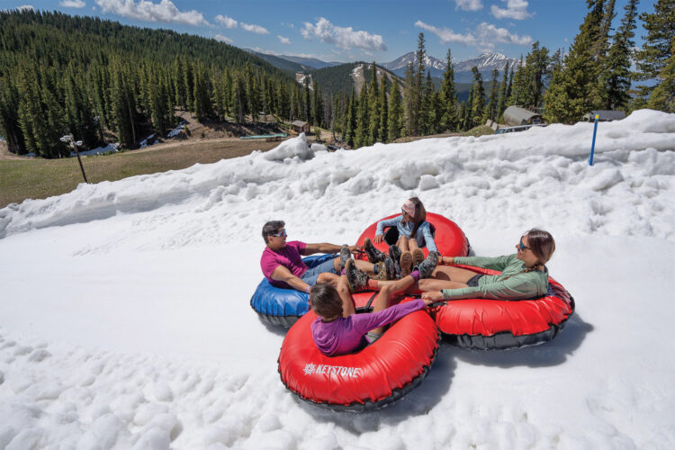 People snow tubing at Keystone Resort.