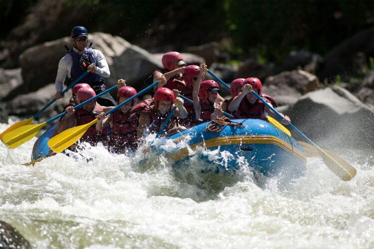 People whitewater raft around Vail.