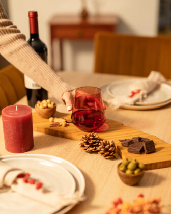 Tablescape with whiskey glass from Saludi Glassware.