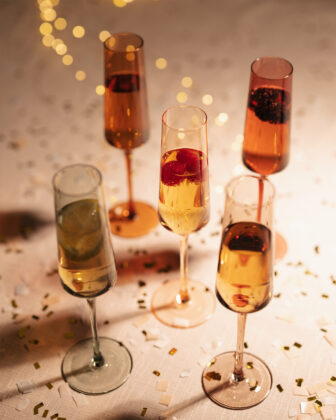 Colorful flute glasses from Saludi Glassware.