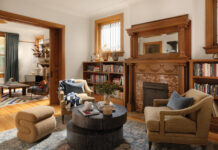 Living room with fireplace in the Denver Square home designed by Atelier.
