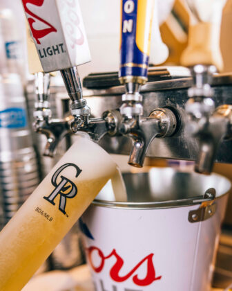 Close up of "beer bat" drink getting filled at Coors Field.
