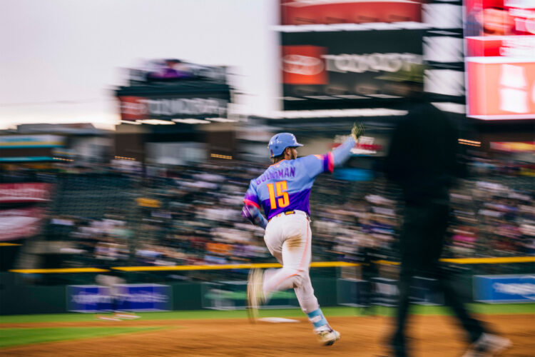 Rockies player runs around the bases wearing the 2026 city connect jersey.
