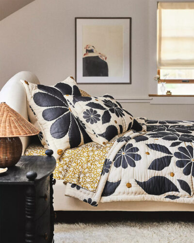 Bedspread with designs from Parrott Paints.